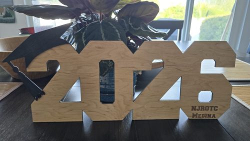 Custom laser engraved 2026 wood sign