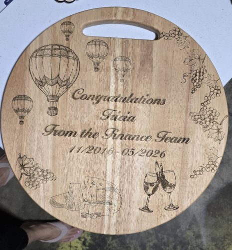 Custom engraved round wood cutting board with personalized message