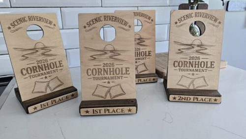 Custom wood cornhole award trophies with engraved names
