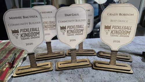 Wood pickleball paddle trophies, custom engraved, with bases